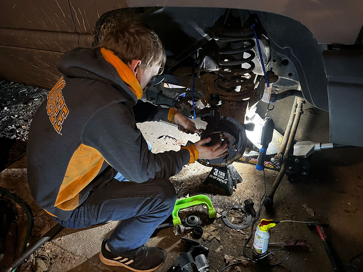 Logan working on truck